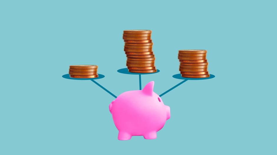 Piggy bank with three stacks of coins